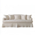 Kremowa sofa trzyosobowa z 4 poduszkami, falbaną i tapicerką poliestrową 220 x 95 x 85 cm